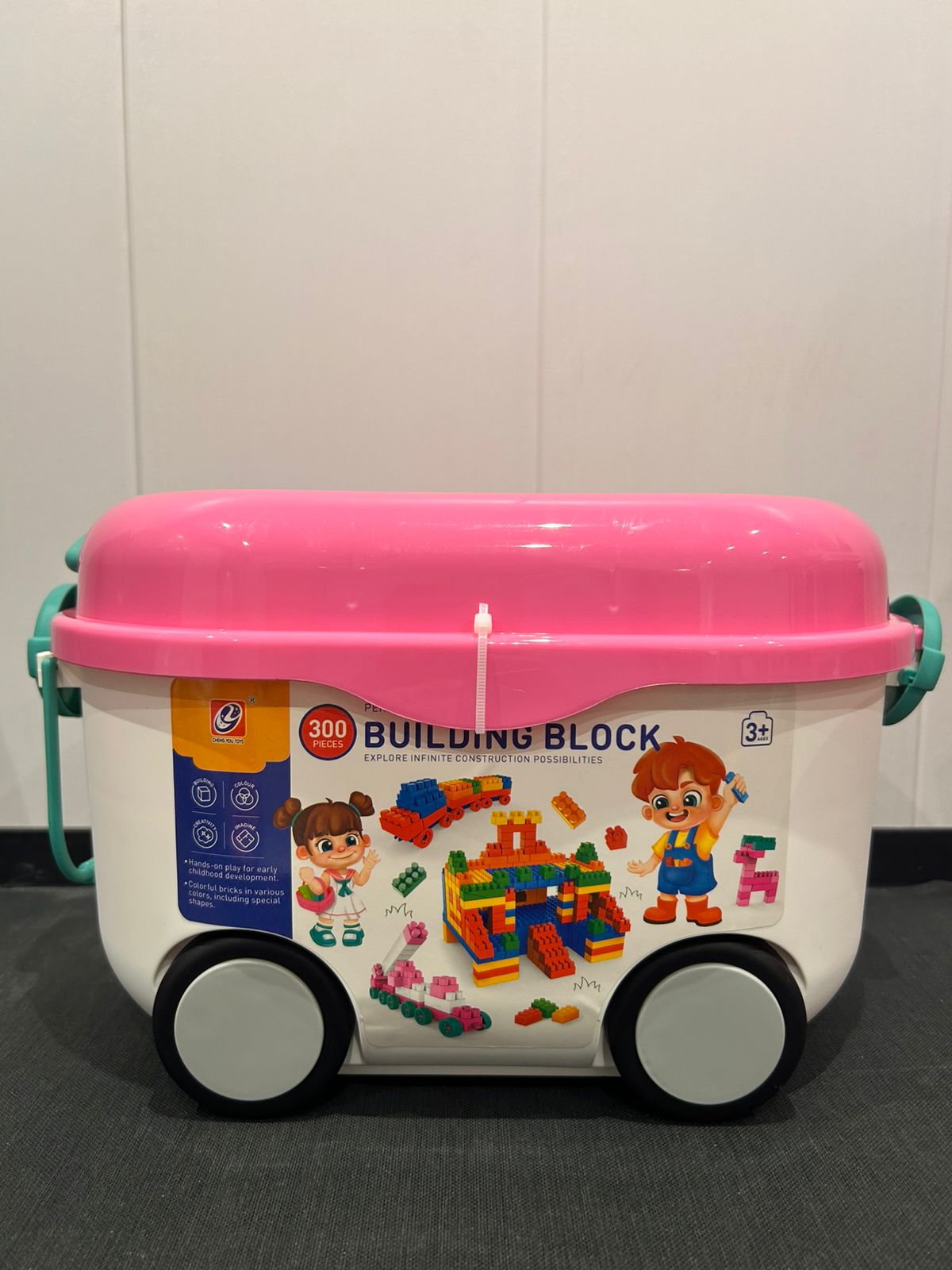 pink rolling building blocks bin with 300 large bricks