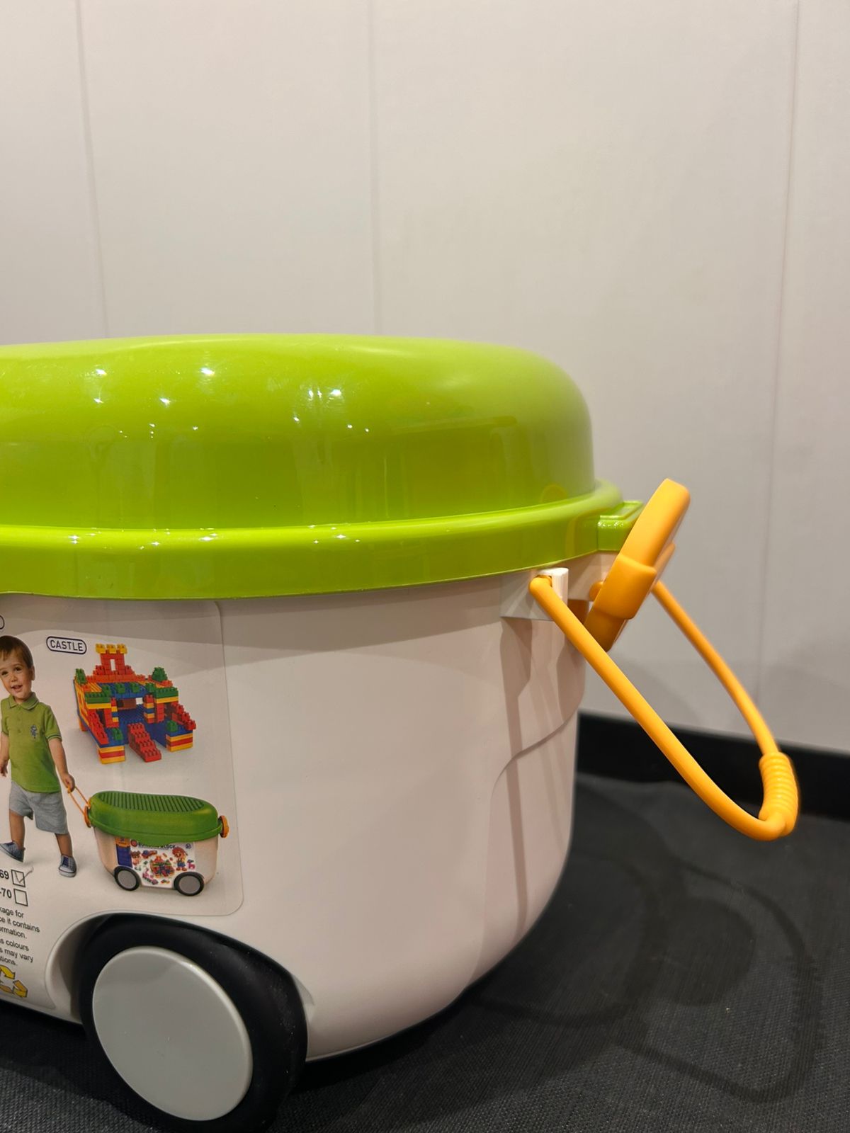 rolling building blocks bin with green build-on lid and wheels