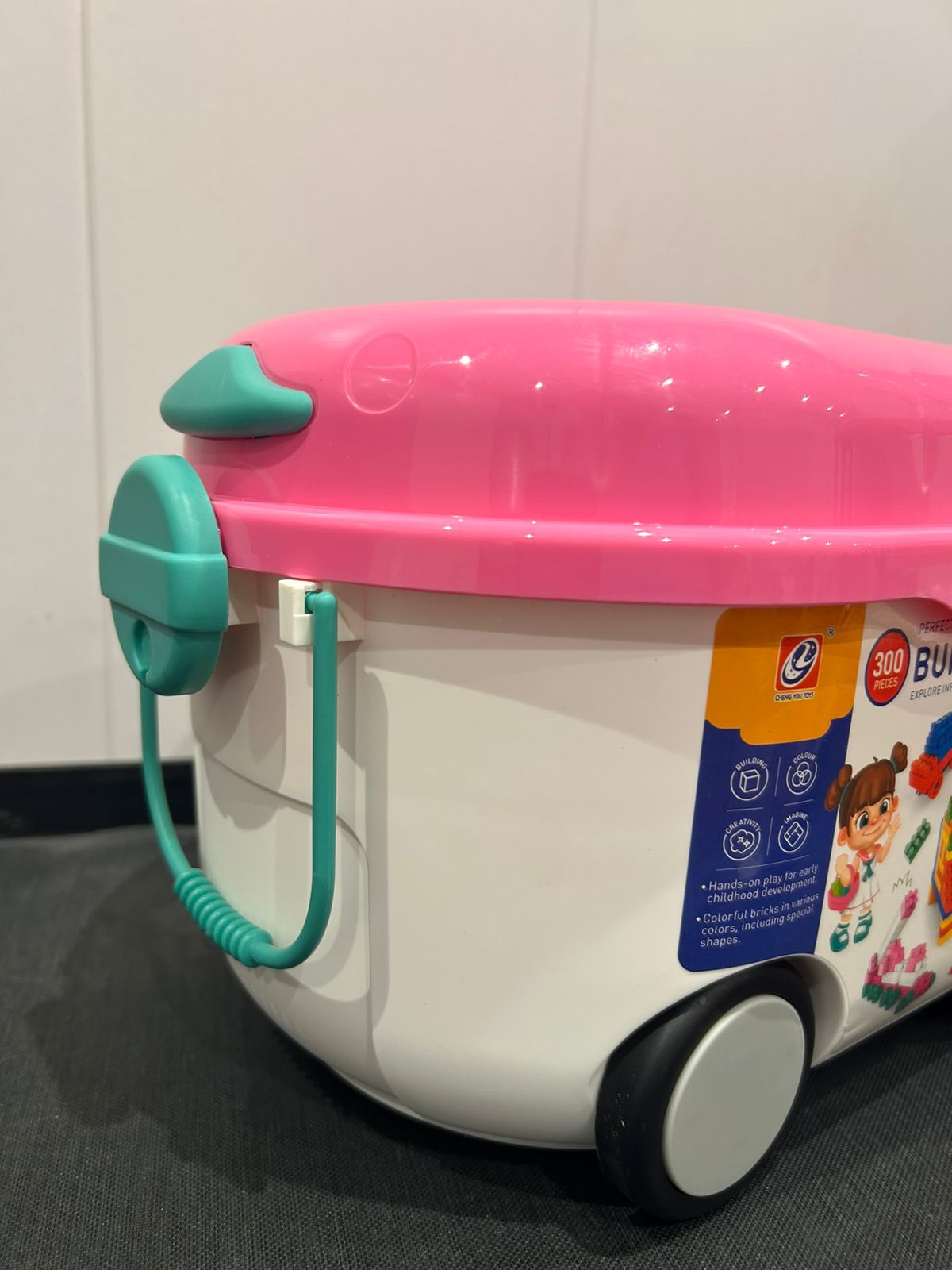 pink rolling building blocks bin with 300 large bricks